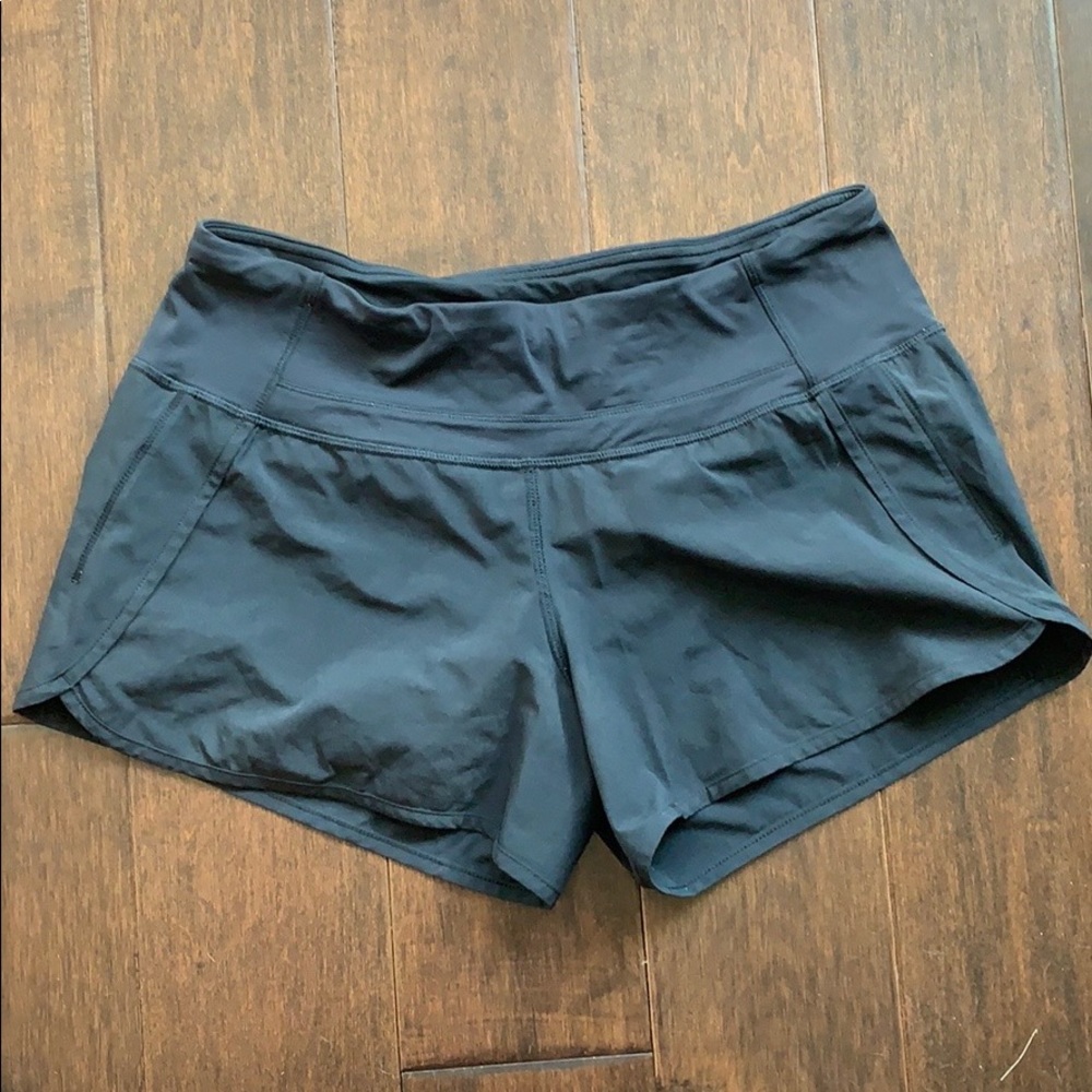 Black Lululemon running shorts, size 6
